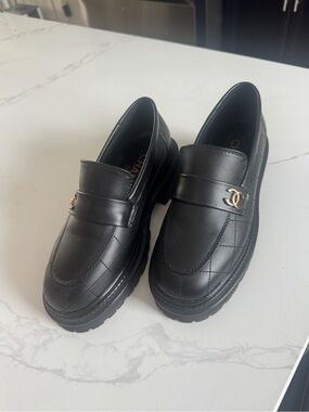 CHANEL Black Quilted Leather Loafers with Gold CC Logo